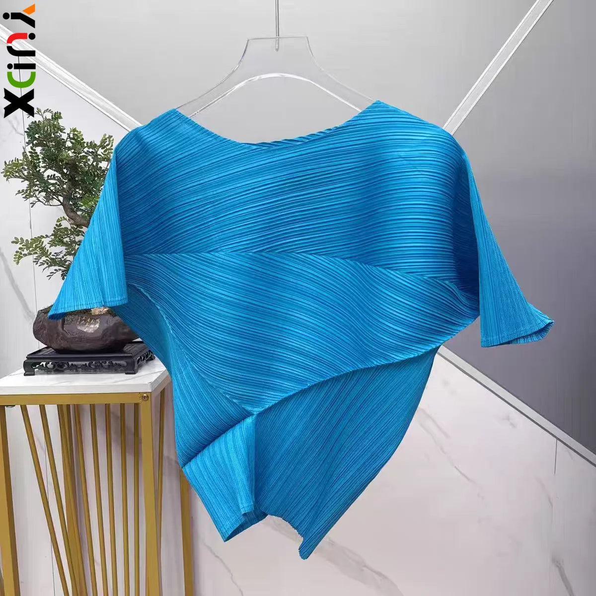 YUDX Vibrant Cyan Blue Miyake Pleated Asymmetric Short Sleeve Top,